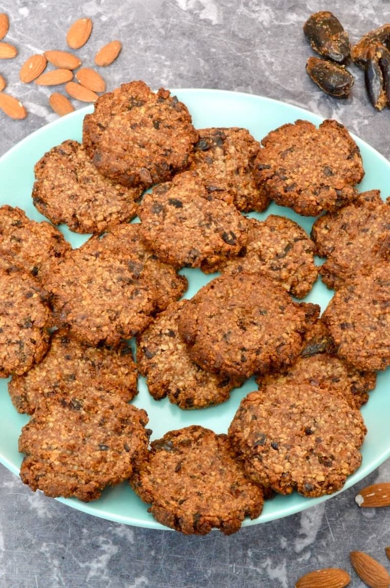Plate of 2-ingredient date and almond cookies.
