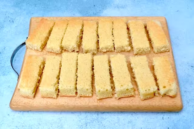 Genoise sponge sliced into sixteen fingers.